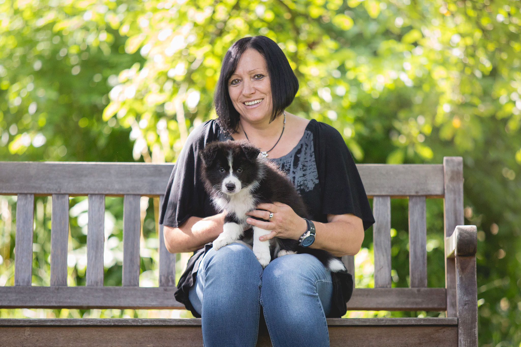 Border Collie Welpe am Tag der Abholung mit neuem Besitzer