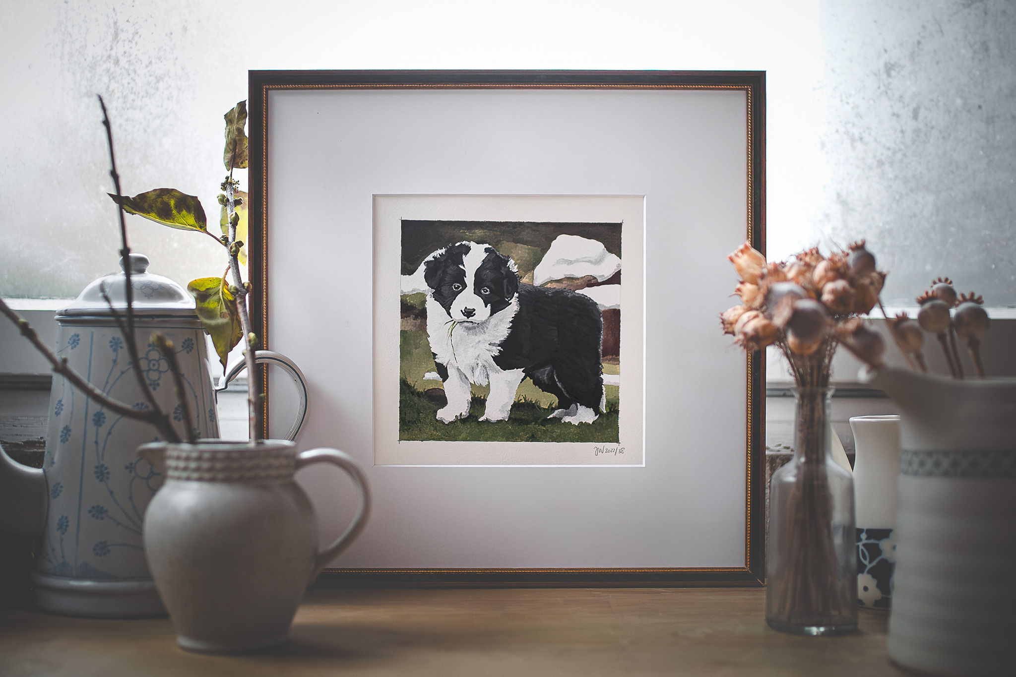 Acrylgemälde eines schwarz-weißen Border Collie Welpen